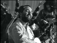 Raffi playing his guitar at the show's rehearsal