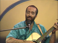 Raffi singing about three little ducks