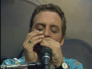 Mitch playing the harmonica