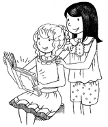 Rachel and Kirsty reading a book.