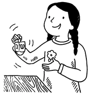 Miriam with a dreidel