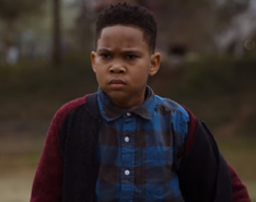 Dion Warren portrayed by Ja'Siah Young