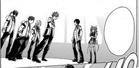 Stella behind Ikki as he face the group of freshmen