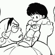 En Ranma en braços del seu pare poc abans de començar el viatge d'entrenament