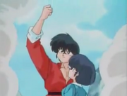 Using the hot water, Ranma is able to protect Akane from the boulder.