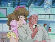 Azusa notices Genma's rice ball and wants it for her own.