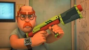 John Charles holding his Moron-O-Meter Stun Gun
