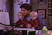 Ray and the twins playing a computer game in "Working Late Again"