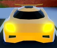 The front view of the Torpedo with its headlights on.