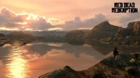 Publicidad de Red Dead Redemption con un bonito atardecer en el lago.
