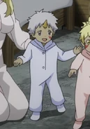 Argento as a Toddler, walking toward his father with a smile on his face.