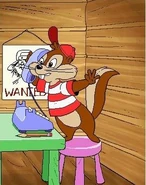 A poster of Spike (behind Charlie) in the intro sequence of Reader Rabbit Kindergarten