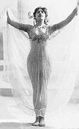 Image of the veil dance taken by Lucien Walery.