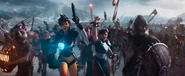 Tracer, Fem Shepard from Mass Effect, Chun-Li, Lara Croft, Cassie Cage from Mortal Kombat, Rayne, and the Deadites in the battlefield.