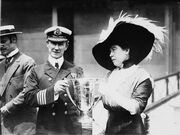 Margaret Brown presenting Arthur Henry Rostron an award