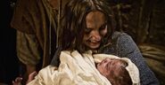 Baby Jesus with his mother Mary the Virgin in The Bible 2013 Movie