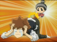 Reborn smacking Tsuna