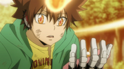 Tsuna looks at Yuni's Pacifier