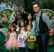 Pamela, Felix, and their daughters in the green carpet premiere of Tinker Bell.