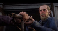 Bartholomew pointing his shotgun at Hosea but his mother intervenes