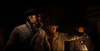 Dutch, alongside Hosea and Arthur, leading the Van der Linde gang in the third trailer