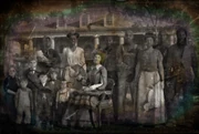 Catherine Braithwaite, Gertrude, and her sons posing for a photo alongside their African American servants.