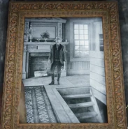 CompsonTrapd.png (1.95 MB) A photo of Compson standing next to his trap door