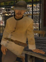 Chan Chut leaning on a table.