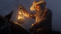 Micah holding a Lantern during Chapter 1 in RDR2