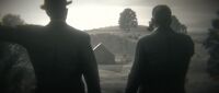 Ross and Fordham observing Beecher's Hope after completing their investigation and tracking down the culprit of Micah's murder, John Marston