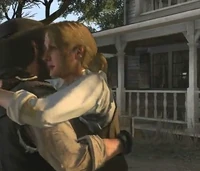 John Marston and Bonnie MacFarlane hugging in the Undead Nightmare trailer.
