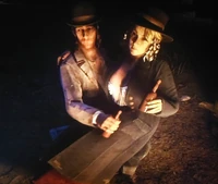 RDR2 Karen and Sean.png (2.43 MB) Karen and Sean in-game at Sean's Return Home Party
