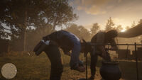 Arthur pouring up some stew