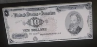 A $10 note featuring President Hardin