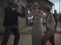 Clyde Garrison and Josephine Bernier harassed by the newspaper boy in Blackwater.