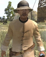 Chan Chut holding a bottle.