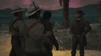 Captain De Santa and his men talk to John Marston.