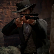 John Marston readying the Rolling Block Rifle.