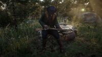 Hosea cleaning his rifle in Horseshoe Overlook