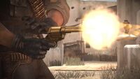 Marston firing the golden revolver.