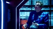 Rimmer holding a Psi-Scan as he argues with Shaft 14 ("Give & Take", Series XI