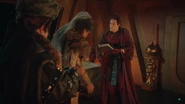 Count Ludo presents Rodon with a confiscated Holy Book