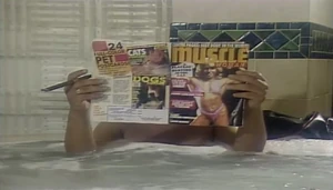 Rimmer reading Muscle Women Magazine