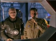 Rimmer and Kryten watch the rest of the crew pass by in the armada ("Only the Good..." extended ending)