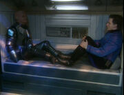Kryten and Rimmer about to enter Deep Sleep