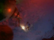 Lister blasts Starbug free from an asteroid with a bazookoid ("Psirens")