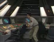 In the science room, Holly detects a space pod. Rimmer believing it to be aliens commands Holly to bring it in ("Waiting for God", Series I)