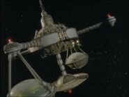 Exterior shot of the botanical gardens of Justice World, located inside the "hanging scales" of the station ("Justice", Series IV)