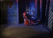 Kryten leaves Red Dwarf on a space bike (seen here "levitating" in the remastered version of "Kryten")