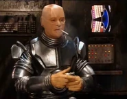 Kryten smoking after being removed of behaviour protocols ("Tikka to Ride")